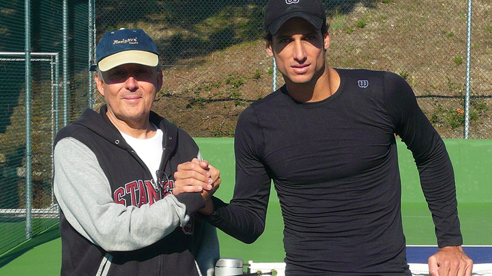 El ingeniero jefe de Universal Sport, Miguel con Feliciano Lopez